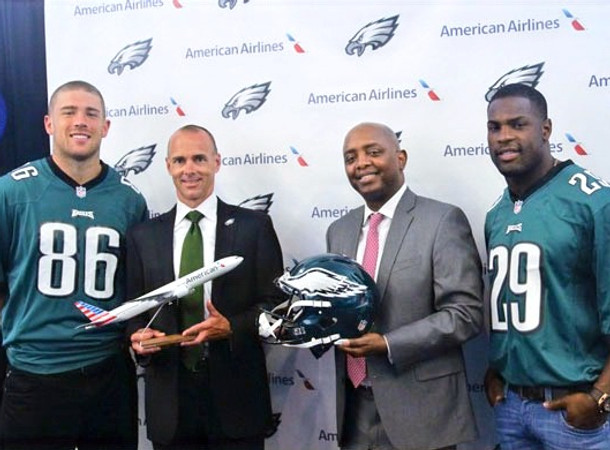 Ceisler Media client American Airlines representatives stand with Philadelphia Eagles players