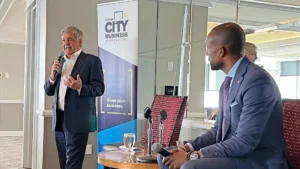 Larry Ceisler standing with a microphone, speaking for the Center City Business Association about key election takeaways