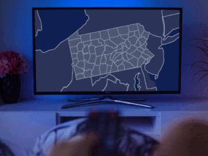 Map of Pennsylvania counties on a TV screen