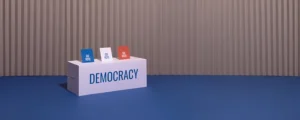 A box with Democracy typed along with messages about going out to vote.