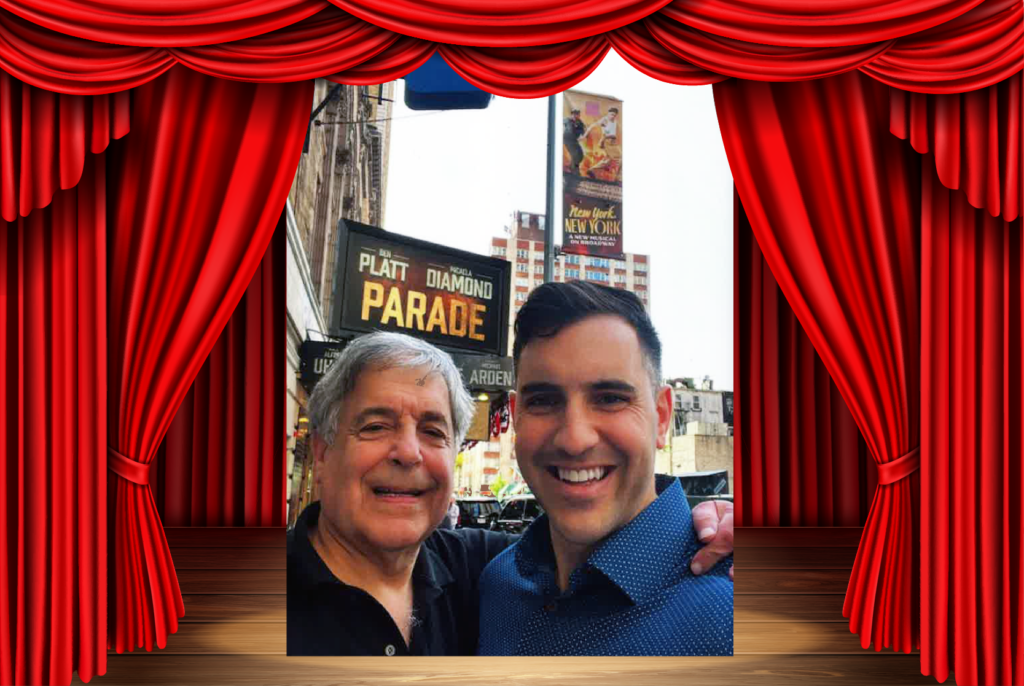 Larry Ceisler and Danny Ceisler outside the marquee of Broadway show, "Parade."